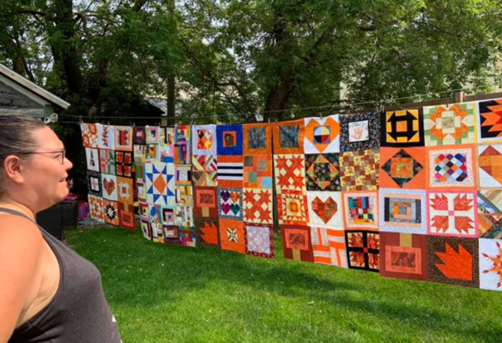 Vanessa Génier and quilts on display